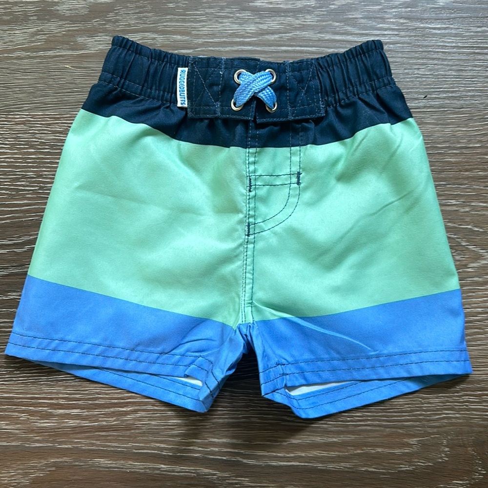 Ruggedbutts blue and green baby boys swim shorts (6-12 months) EUC